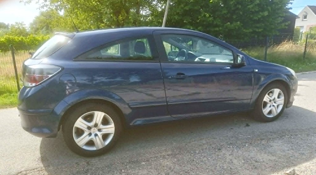 Opel Astra GTC 1.4i Airco, Auto's, Stof, Zwart, 4 cilinders, Blauw