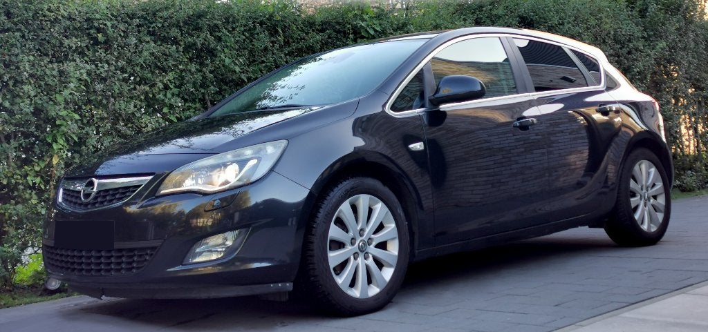 Opel Astra 2012 full option 1.7 diesel E5, Auto's, Voorwielaandrijving, Euro 5, 4 cilinders, Zwart