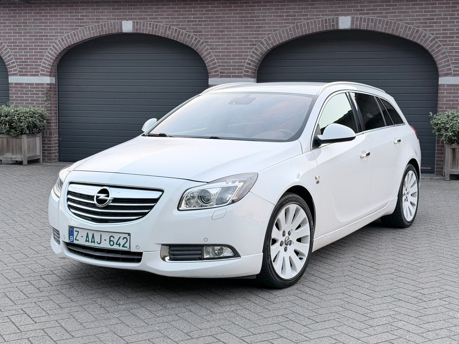 Opel insignia Sport tourer sw Opc Line 2.0Cc 129.000km 2011, Auto's, Bluetooth, Euro 5, Wit, Leder