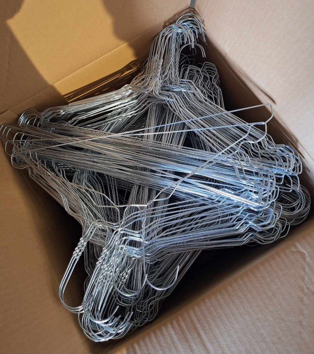 Lot de 1200 cintres neuf, Enlèvement