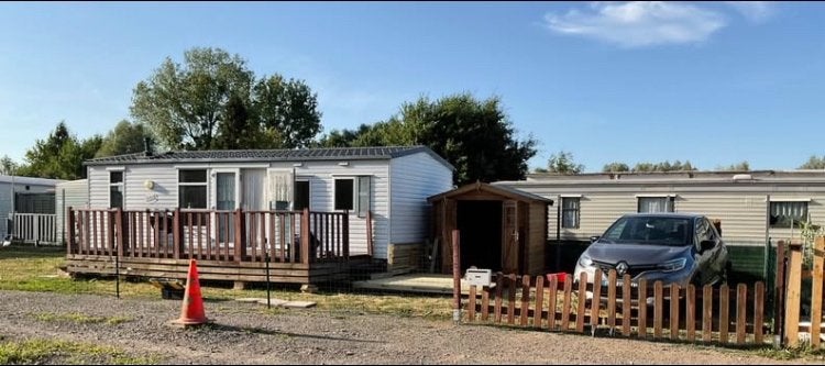 Stacaravan of wooncaravan, Internet, Aan zee, Dorp