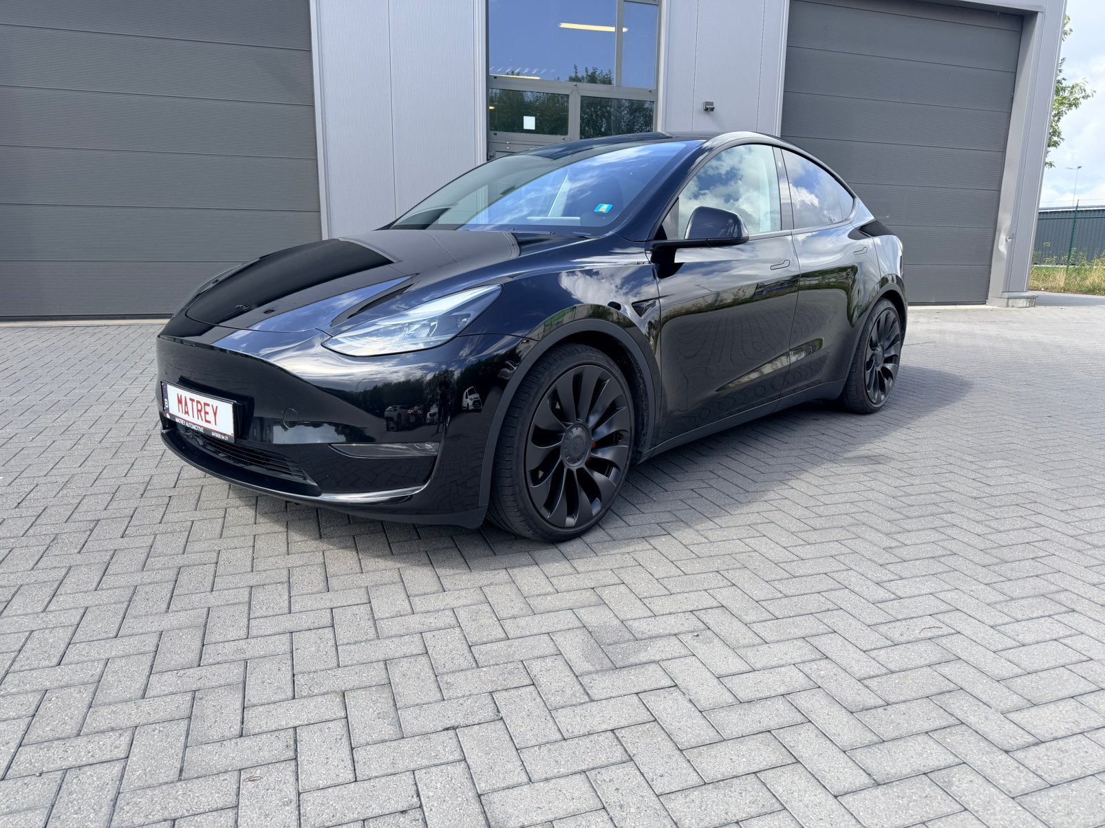 Tesla model Y Performance BTW TREKHAAK, Auto's, Automaat, Zwart, Leder, Trekhaak