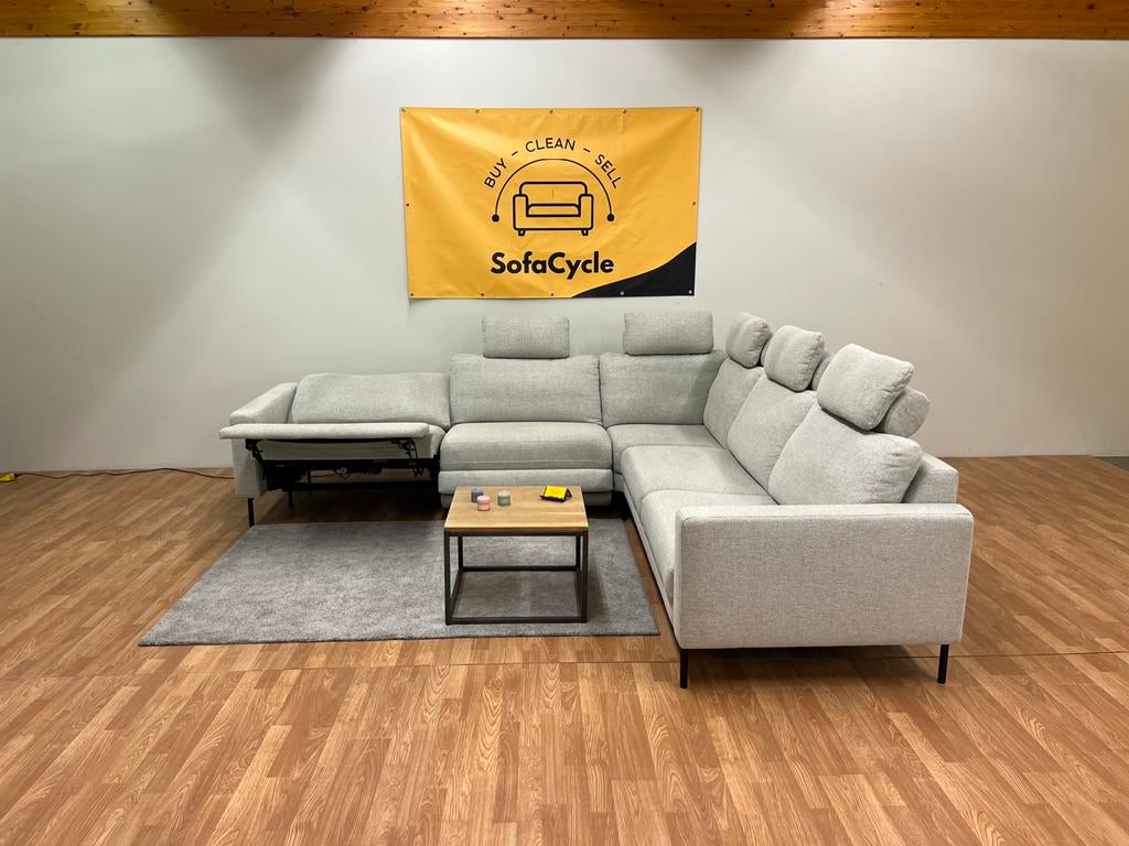 Siège en L gris avec fauteuil inclinable et appuie-tête