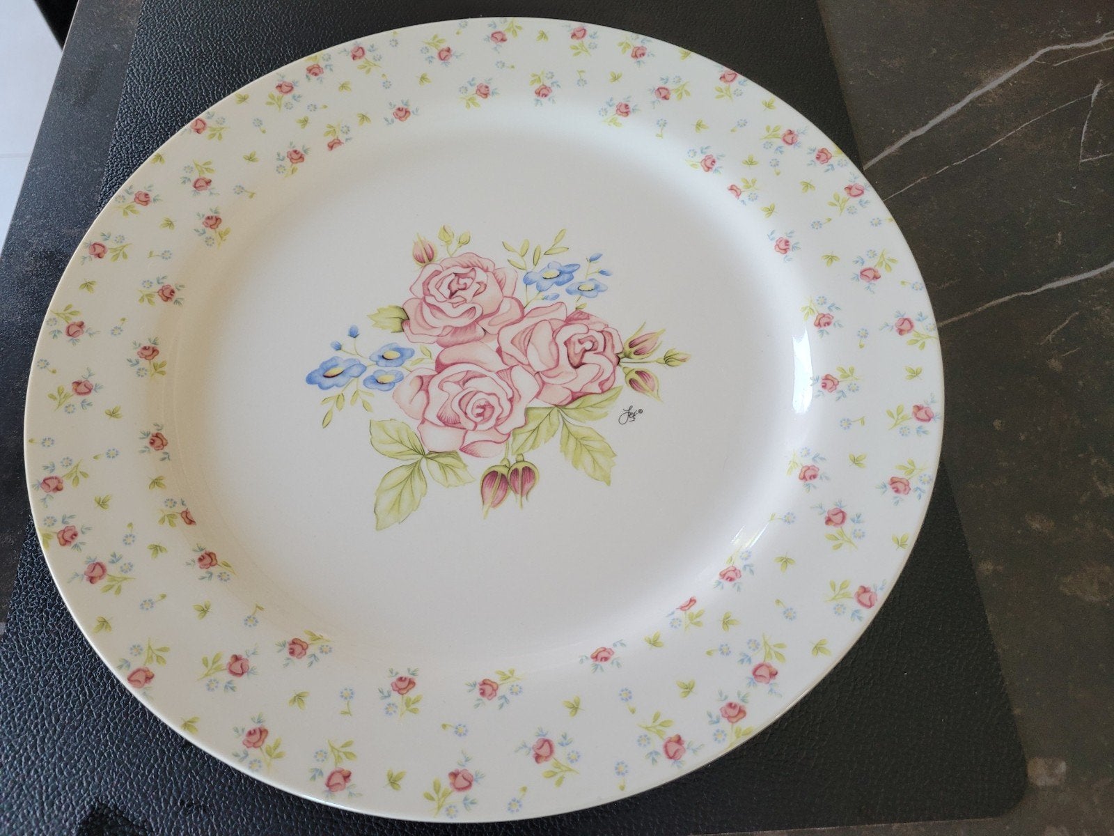 Taartbord met bloemen, Ophalen