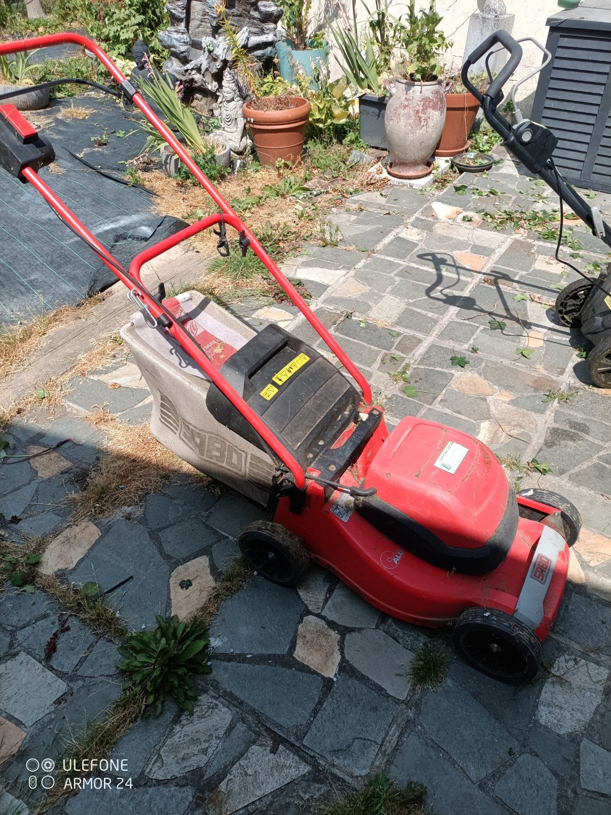 Electrische grasmaaier, Ophalen