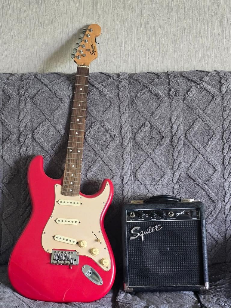 Gitaar elec met versterker zonder snaren, Ophalen