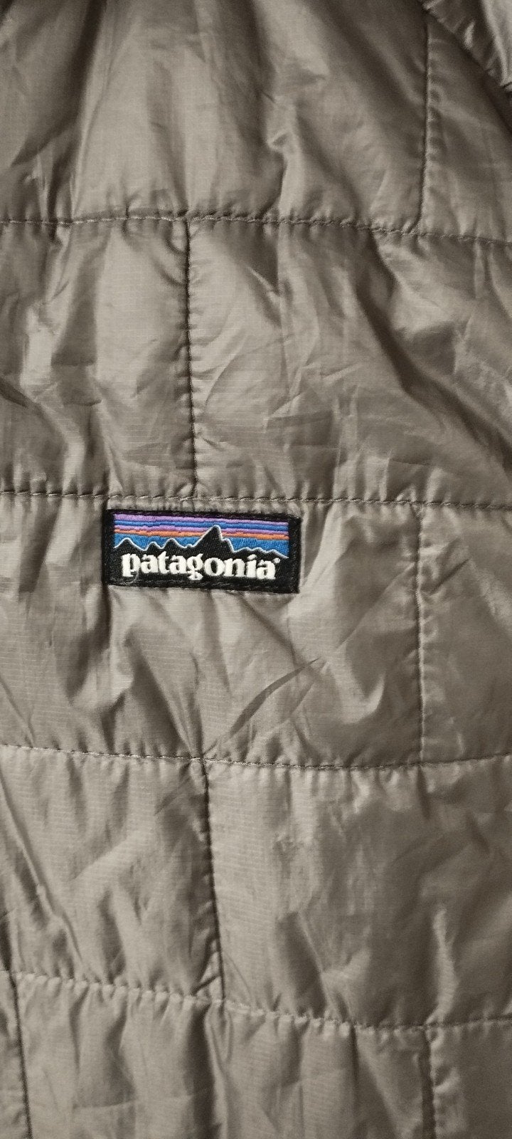 Patagonia Primaloft mouwloos jack, Ophalen