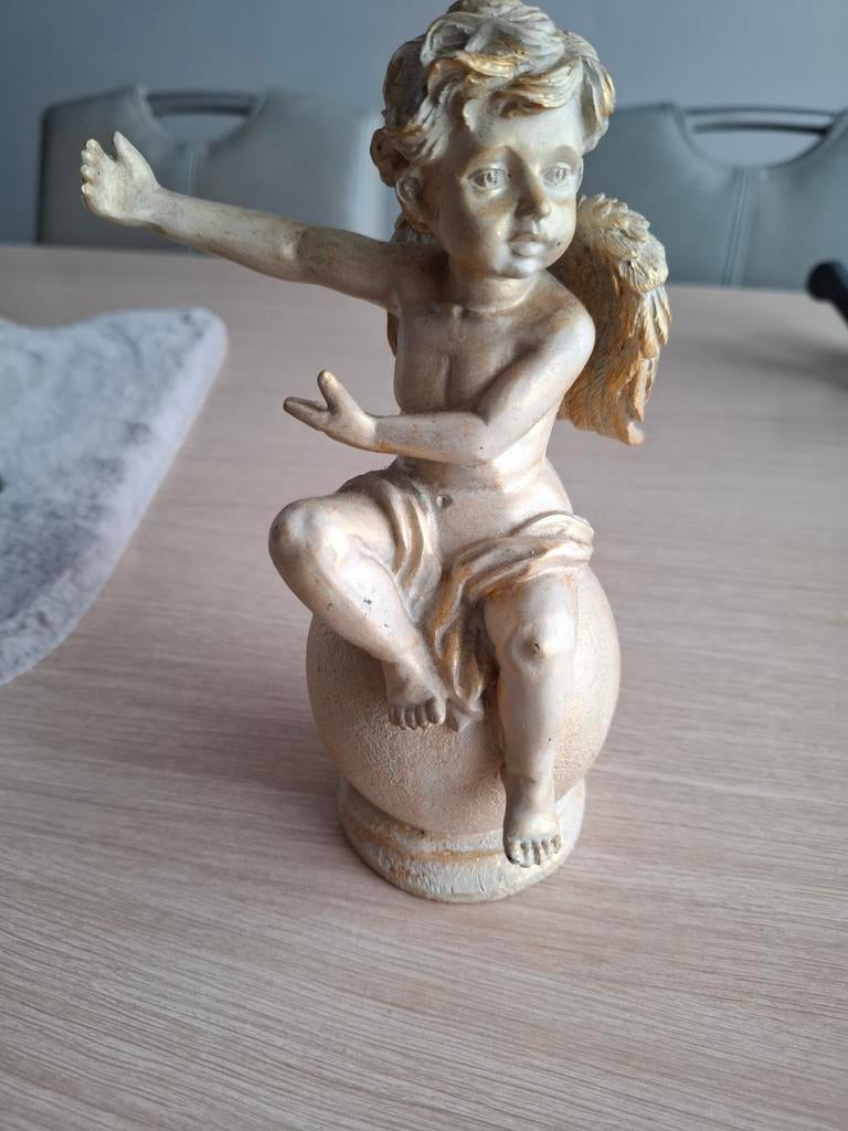 Engel beeldje, Ophalen