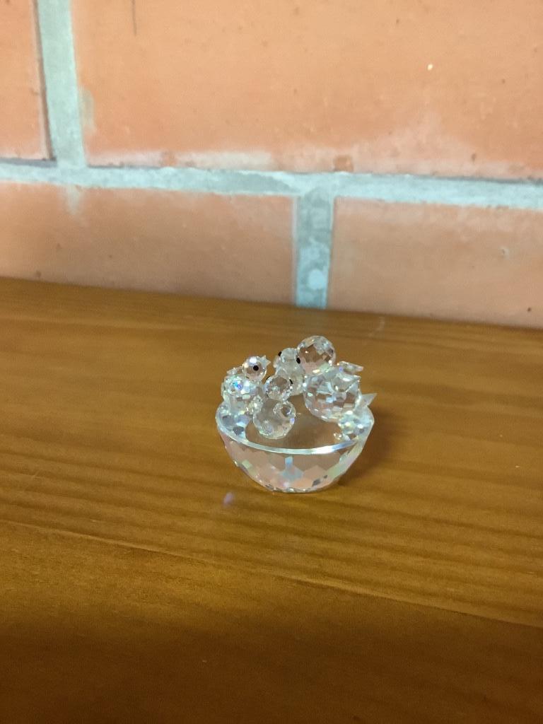 Swarovski vogelnestje, Ophalen