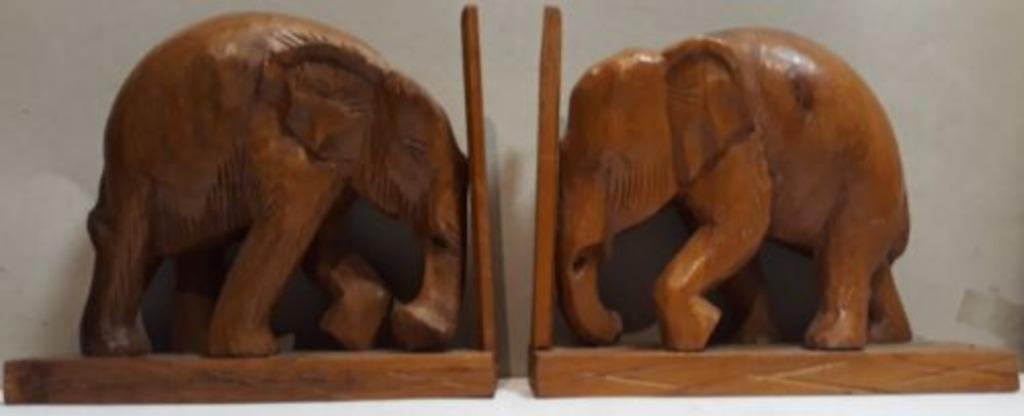 Paar boekensteunen van ebbenhouten olifanten, Antiek en Kunst, Ophalen of Verzenden