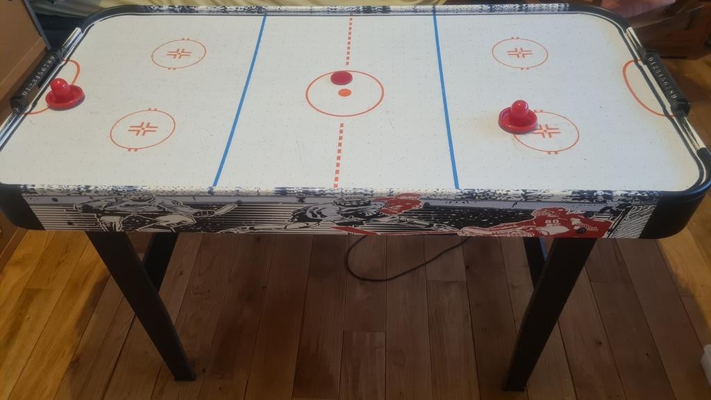 Jeu air hockey, Ophalen