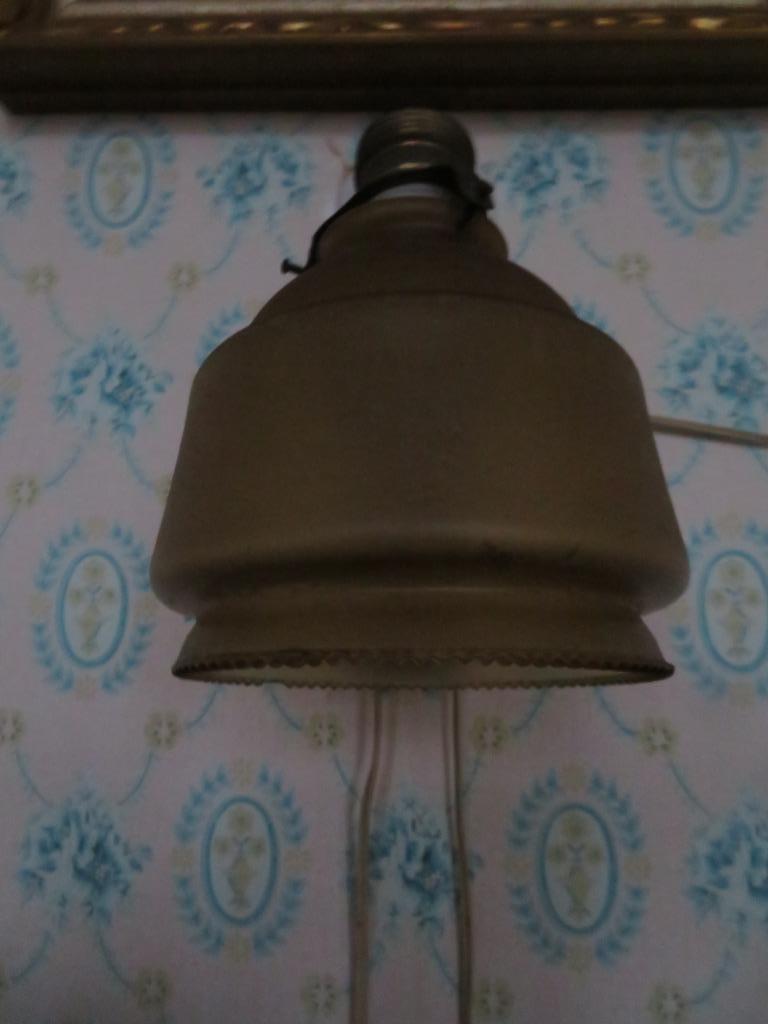 Antieke wandlamp, Enlèvement