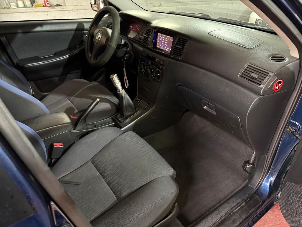 toyota corolla alpha 2003, Auto's, Voorwielaandrijving, 4 deurs, Stof, Zwart
