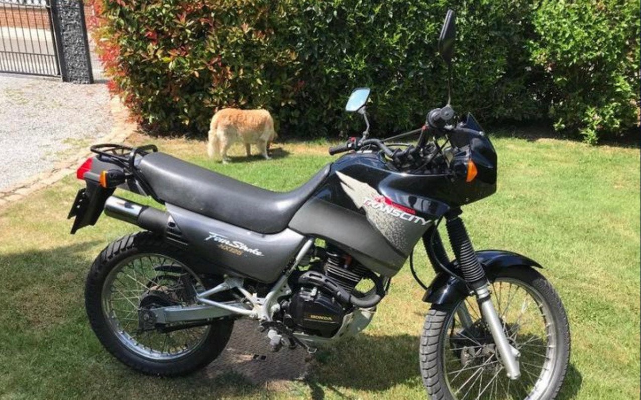 Honda NX 125 Transcity – Excellent état, Vélos & Vélomoteurs, Enlèvement, Comme neuf, Honda