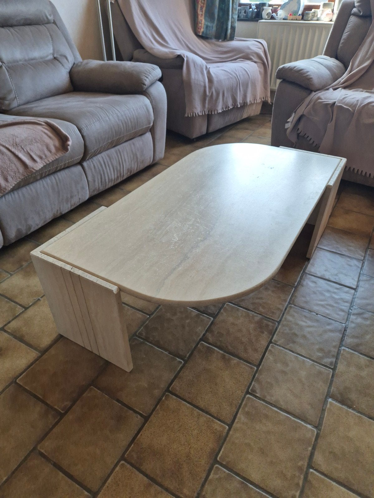 Table basse en travertin, Enlèvement