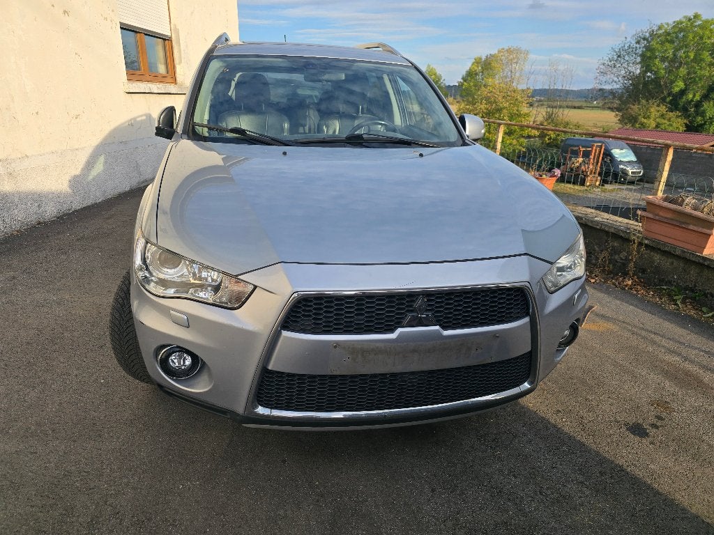 Mitsubishi Outlander 2010 4X4 156 pk diesel 7 zitplaats Auto, Auto's, Automaat, Outlander, Zwart, 4 cilinders