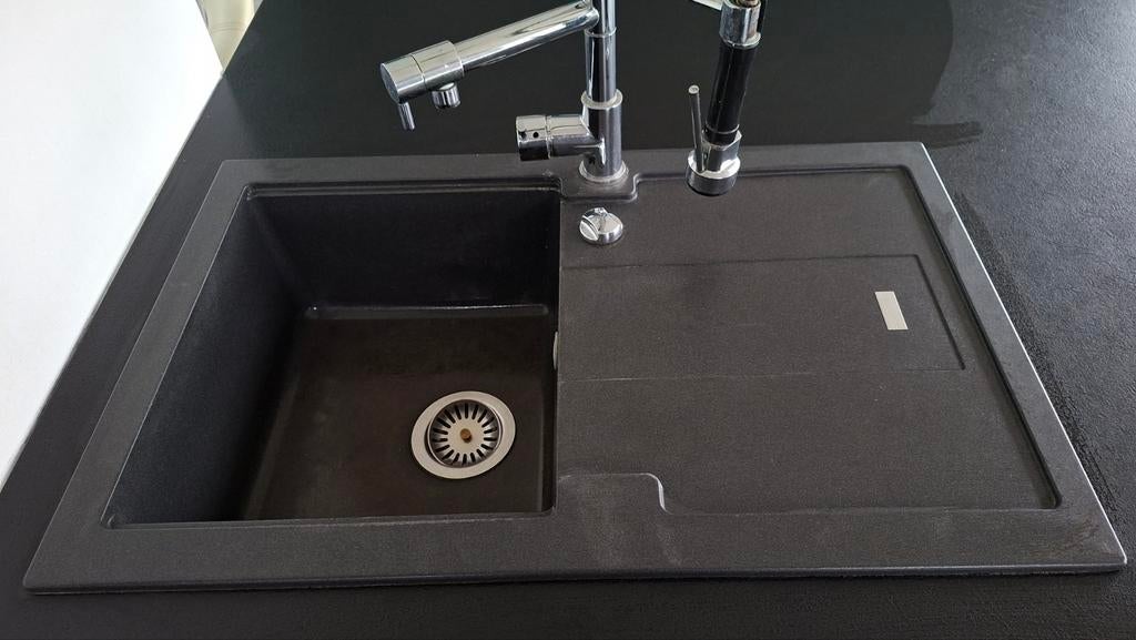 Kraan en spoelbak, Ophalen