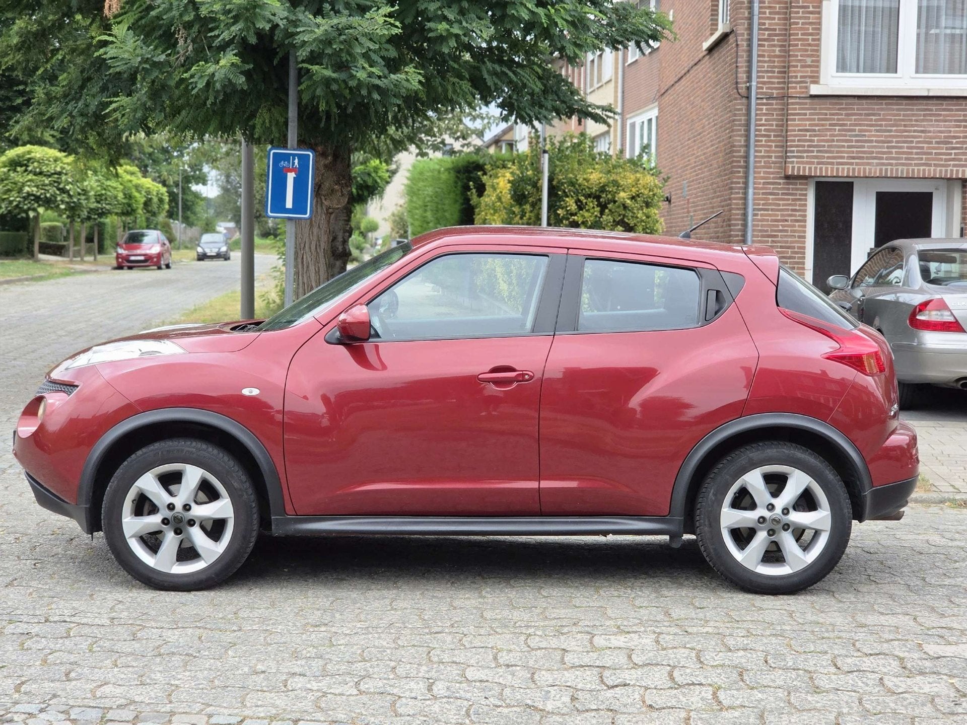 Nissan Juke 1.6i 2WD 1E EIGENAAR PERFECTE STAAT GEKEURD VVK, Euro 5, Stof, Gebruikt, Zwart