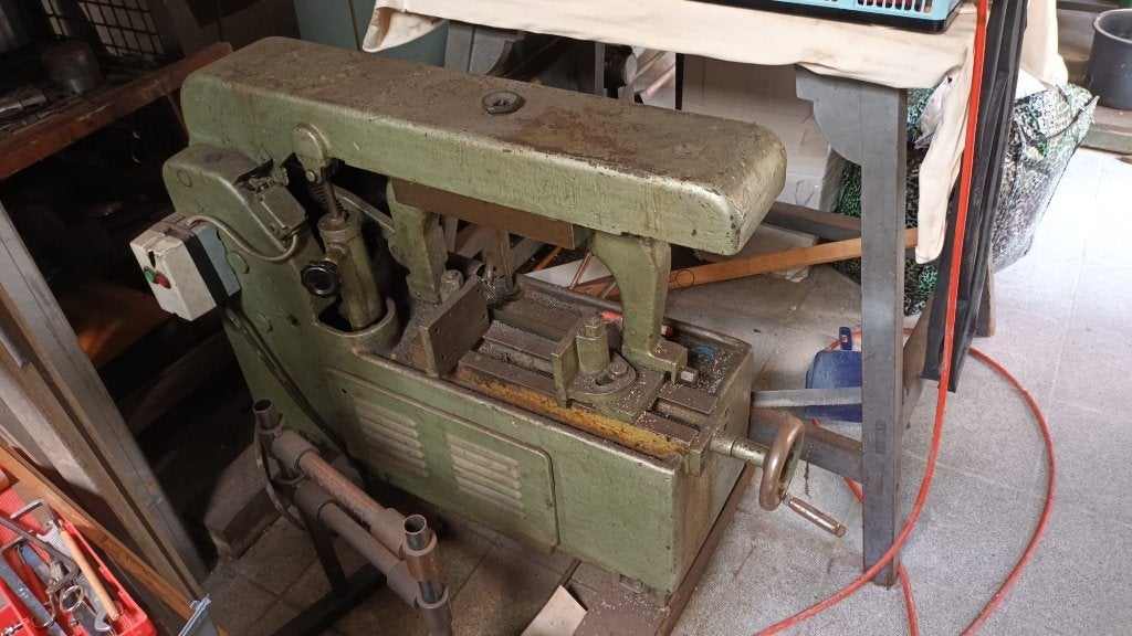beugelzaagmachine, Ophalen