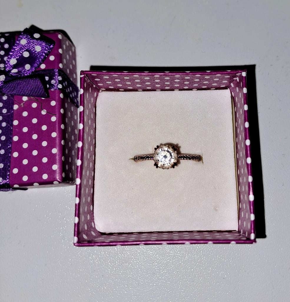 Rosé ring swarovski, Ophalen
