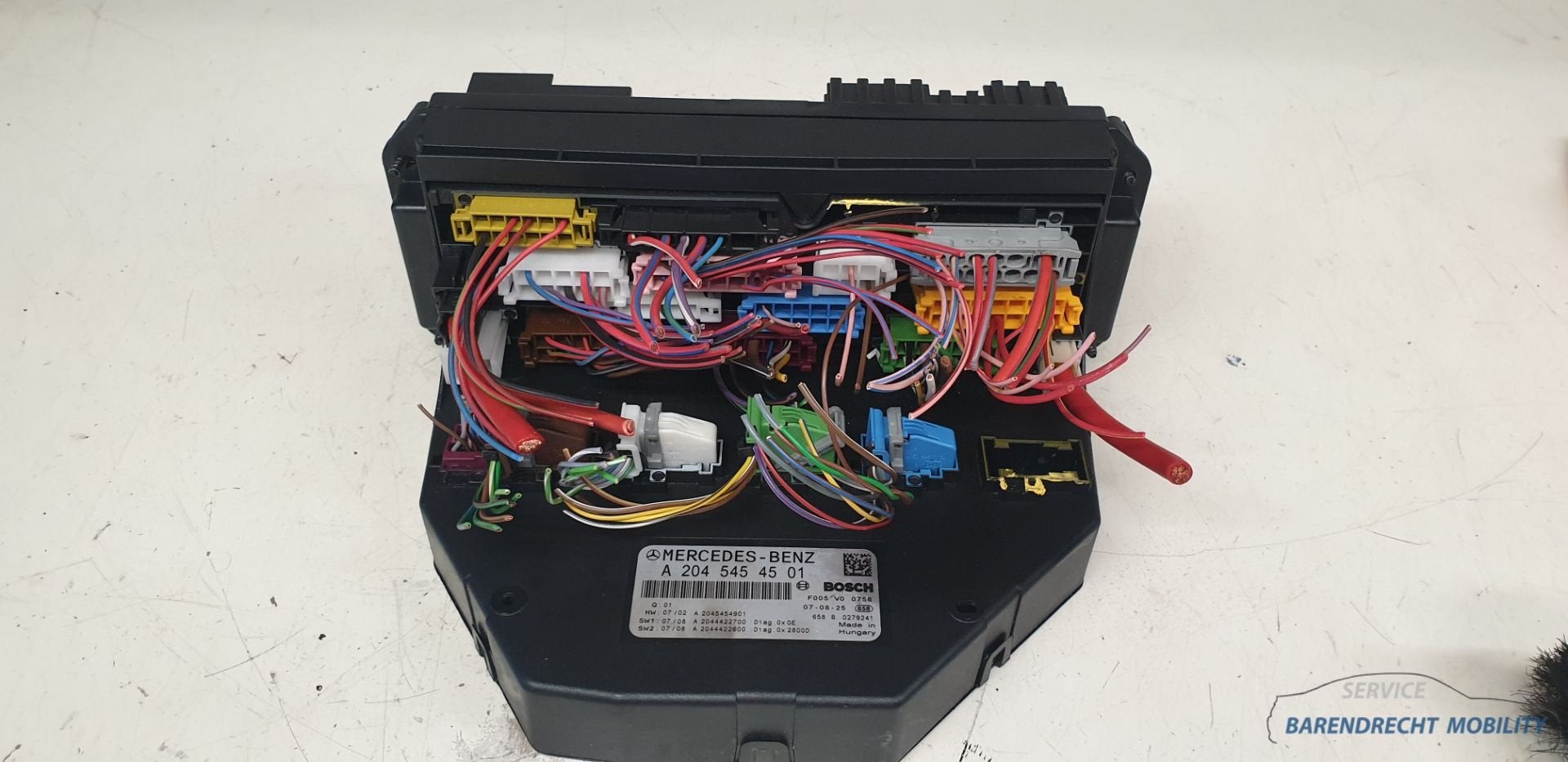 Bo te fusibles du module SAM W204 Mercedes Classe C A2045454, Mercedes-Benz AG, Mercedes-Benz, Utilisé, Mercedesstrasse 120
70372  Stuttgart, DE