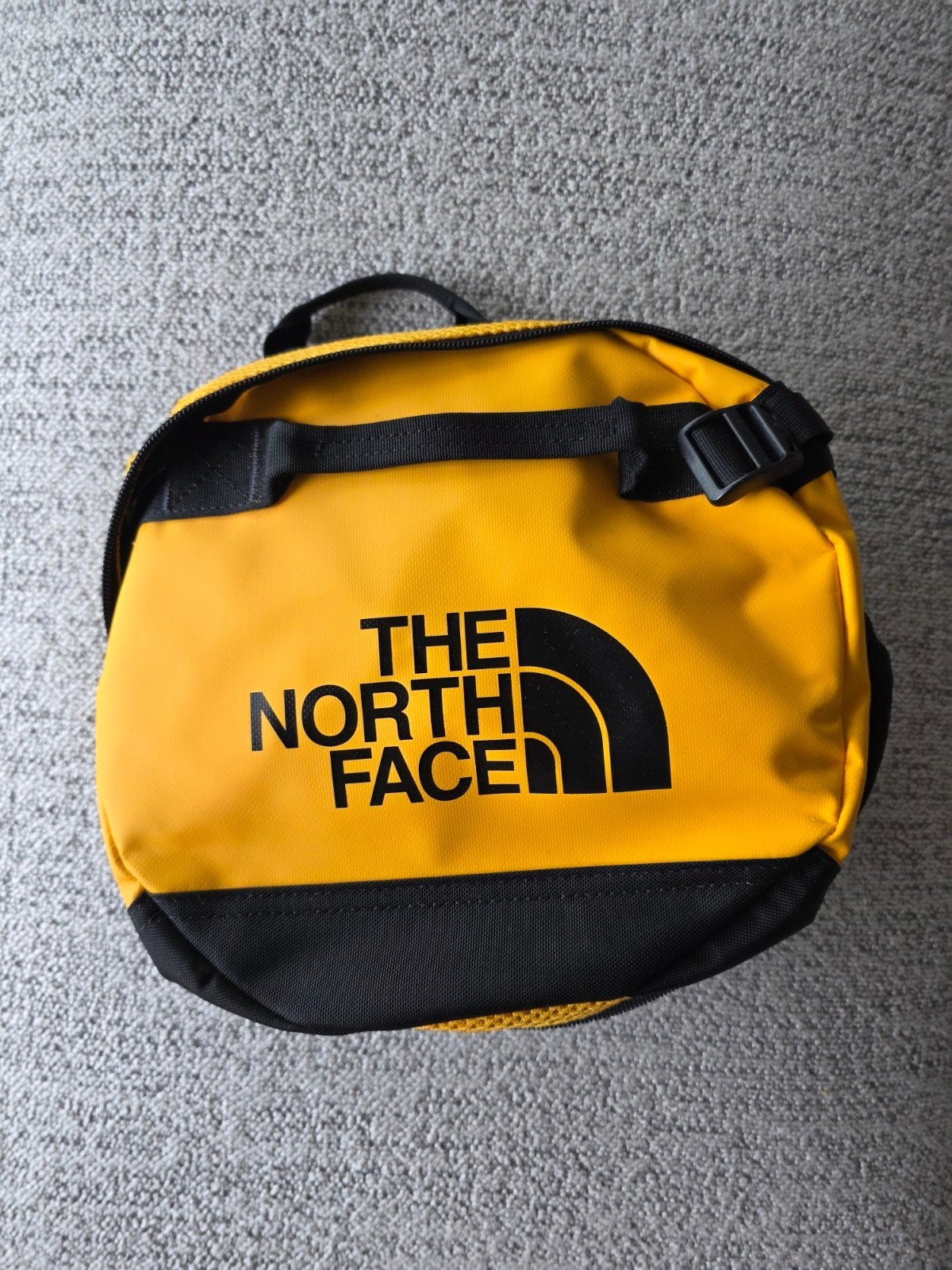 The North Face duffel XS goudgeel, Handtassen en Accessoires, Verzenden, Nieuw