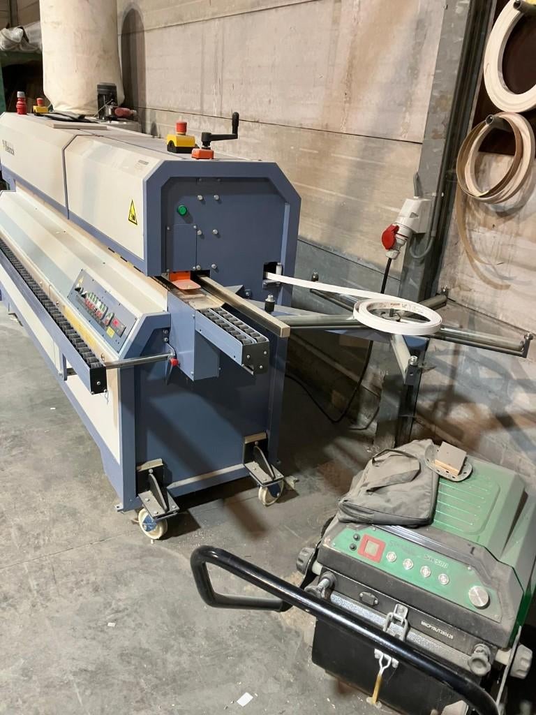 Machine à cerner les bords Herock F4, Enlèvement