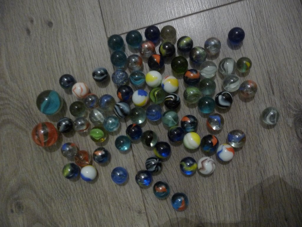 73 knikkers, Ophalen of Verzenden, Gebruikt