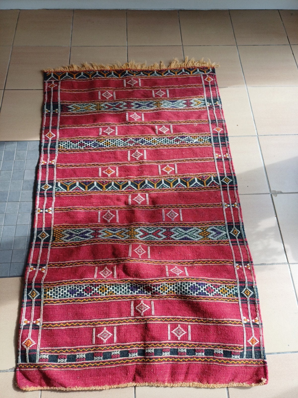 Tapis berbère artisanal, Enlèvement
