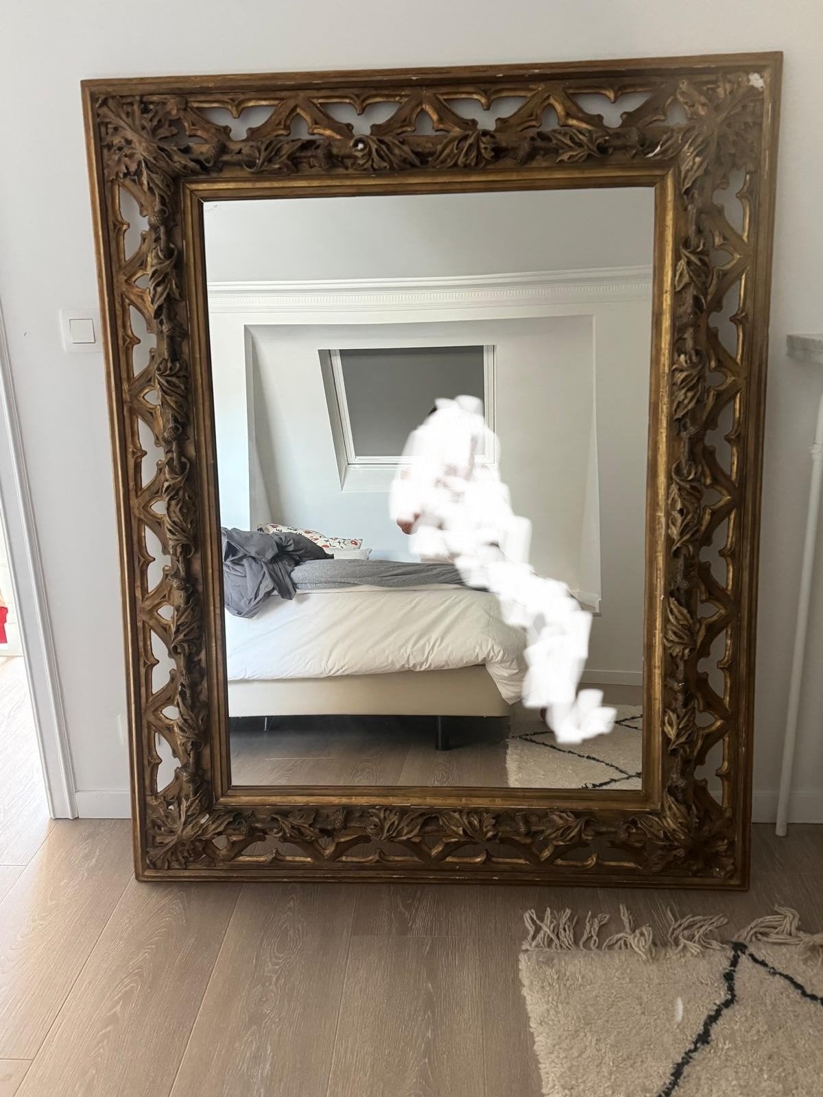 Miroir baroque en métal doré, Enlèvement