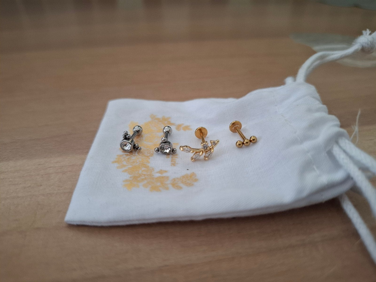 4 piercings neufs, Handtassen en Accessoires, Toilettassen, Ophalen of Verzenden, Nieuw, Zilver, Dame