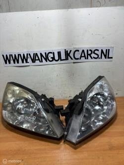 Koplamp set Nissan Primera III ('02-'09), Gebruikt, Ophalen of Verzenden, Nissan, Nissan
