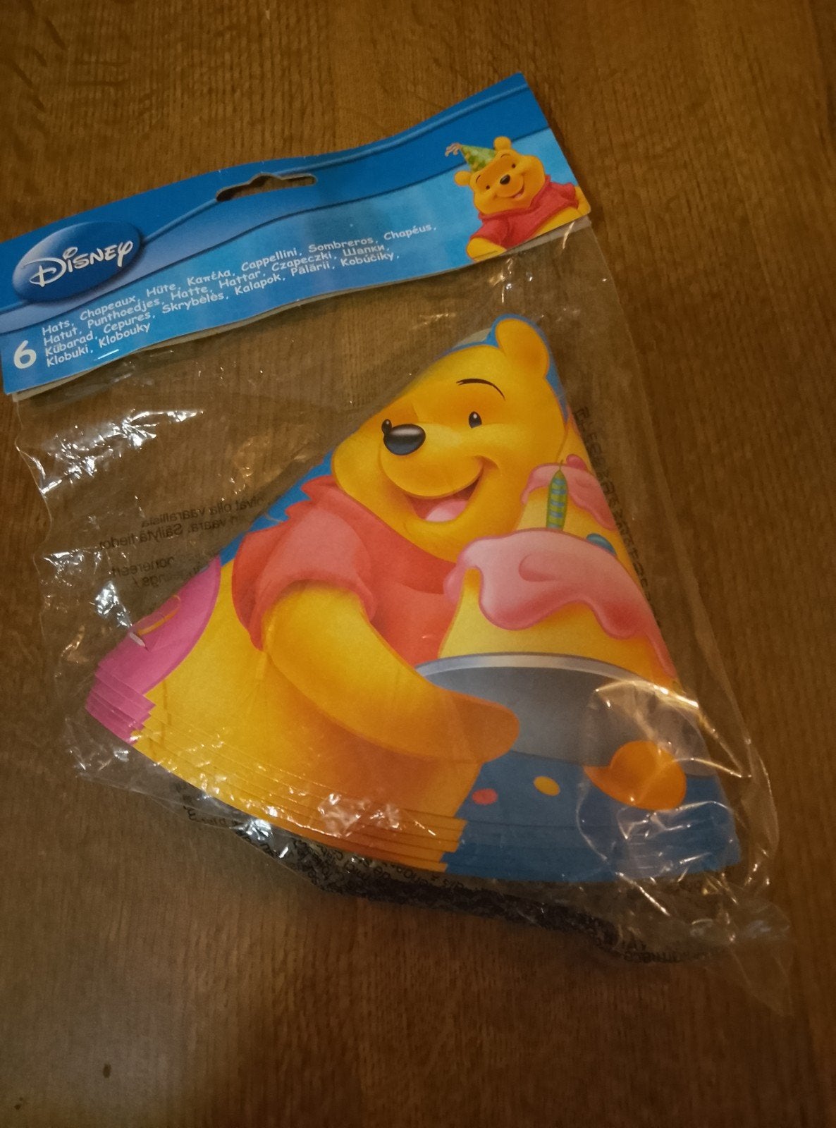 6 Feesthoedjes Pooh bear, Ophalen