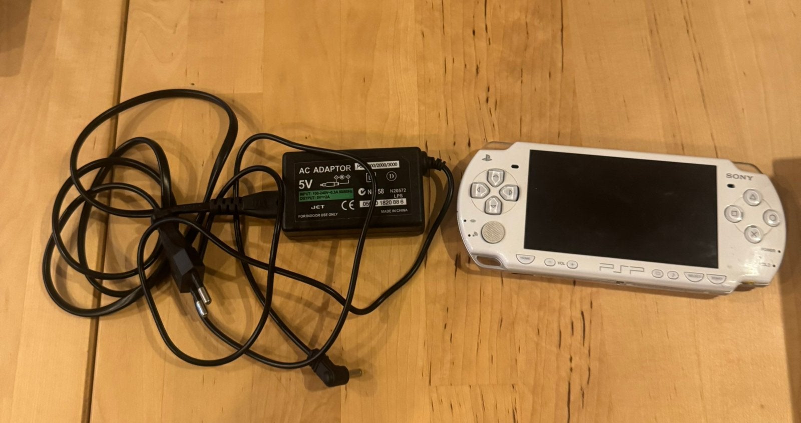 Psp slim met verschillende games, Ophalen of Verzenden, Zo goed als nieuw