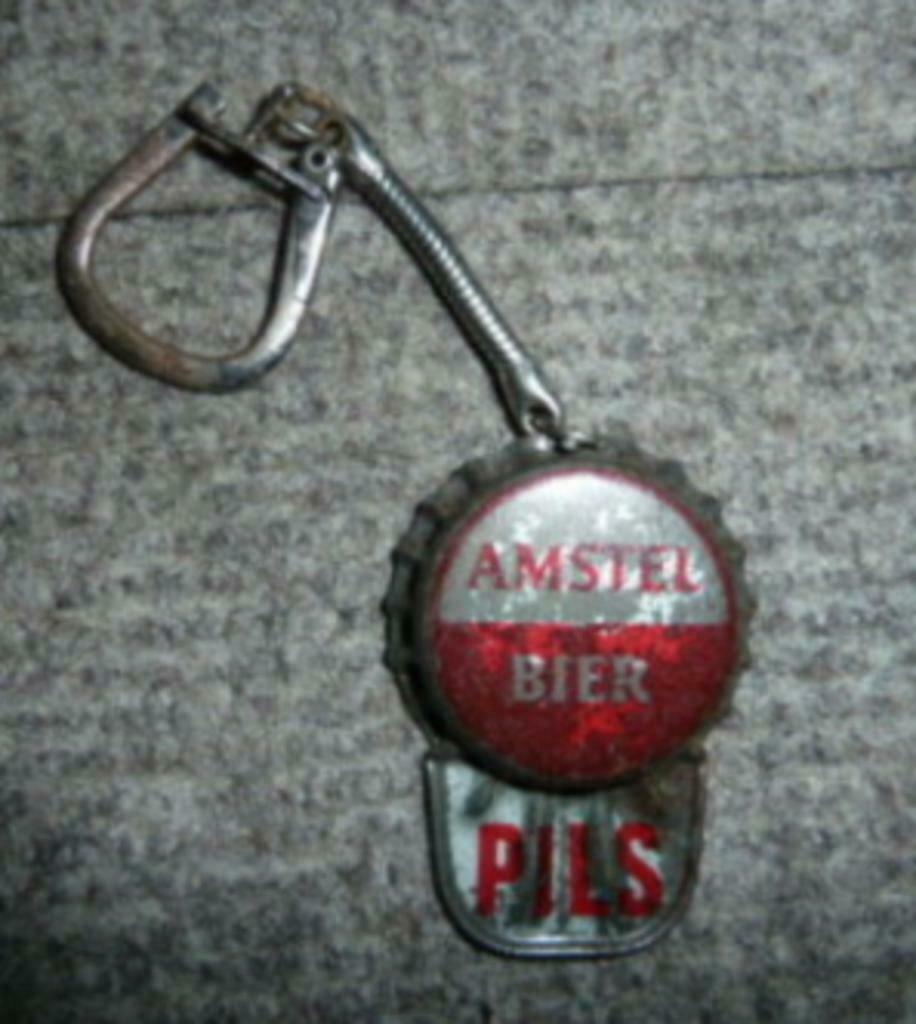 # sleutel hanger in de vorm van een kroonkurk  AMSTEL BIER, Ophalen of Verzenden, Gebruikt, Overige typen, Amstel