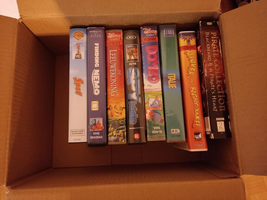Vhs/dvd/sealed stuff. Bieden!, Ophalen