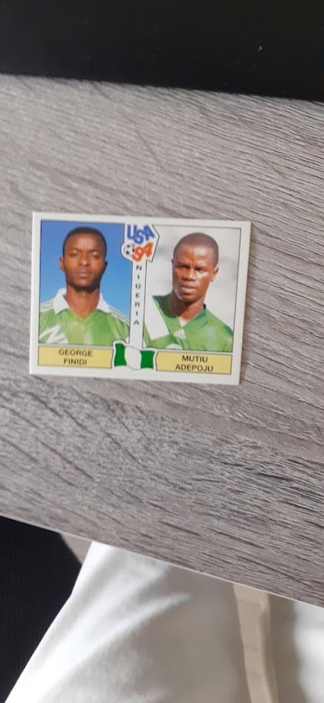 Panini World Cup USA 94.Autocollant Finidi/Adepoju.Dos noir., Enlèvement ou Envoi, Comme neuf, Sport