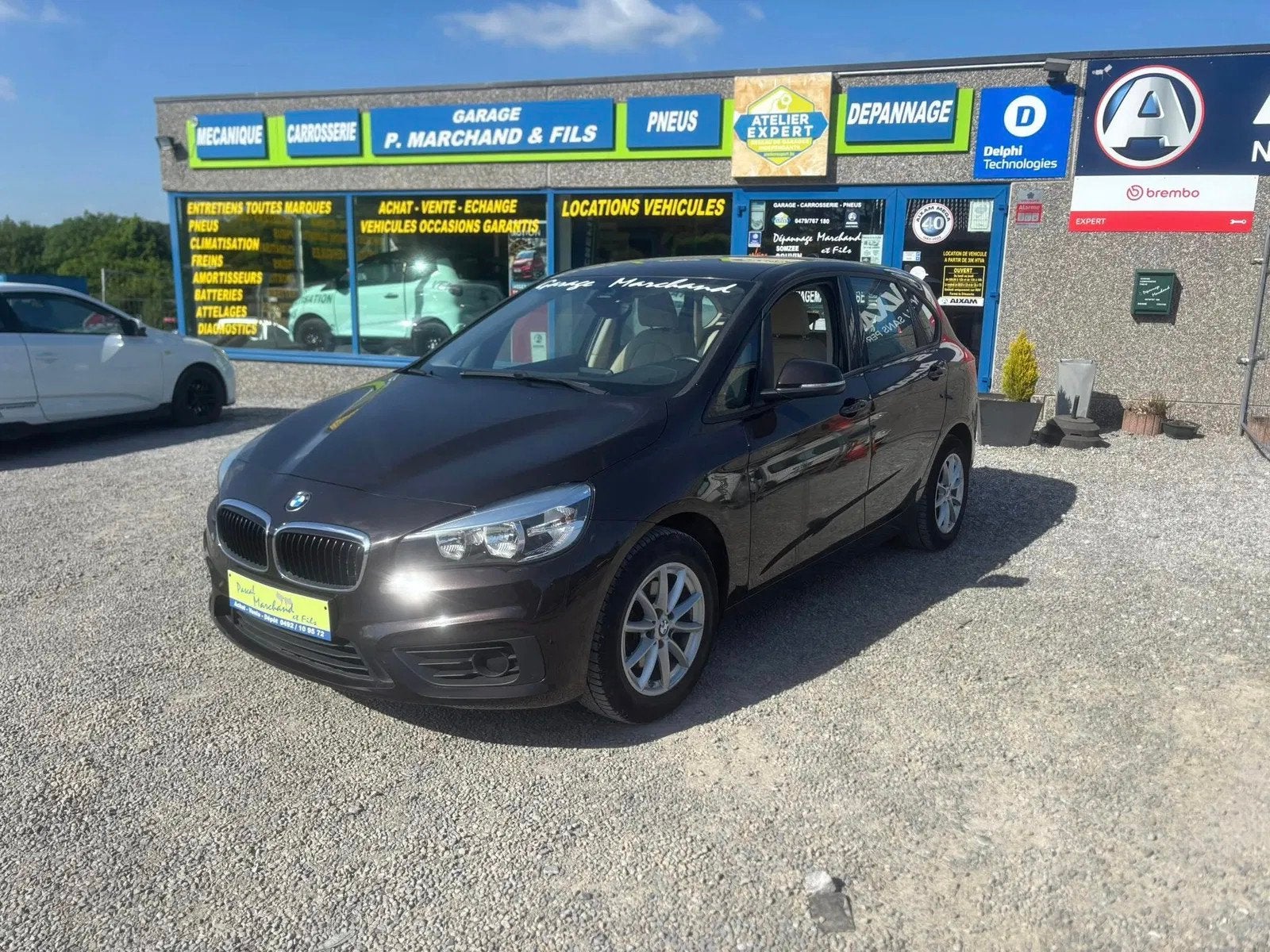 BMW 2 Serie (bj 2017), Auto's, Monovolume, Gebruikt, Bruin, 116 pk