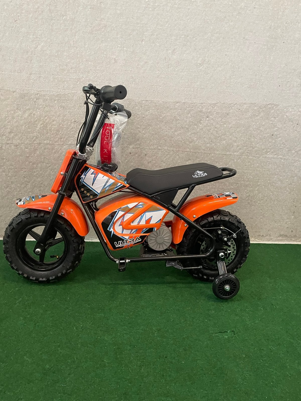 Nieuwe Ultra elektrische oranje motor met zijwieltjes, Nieuw