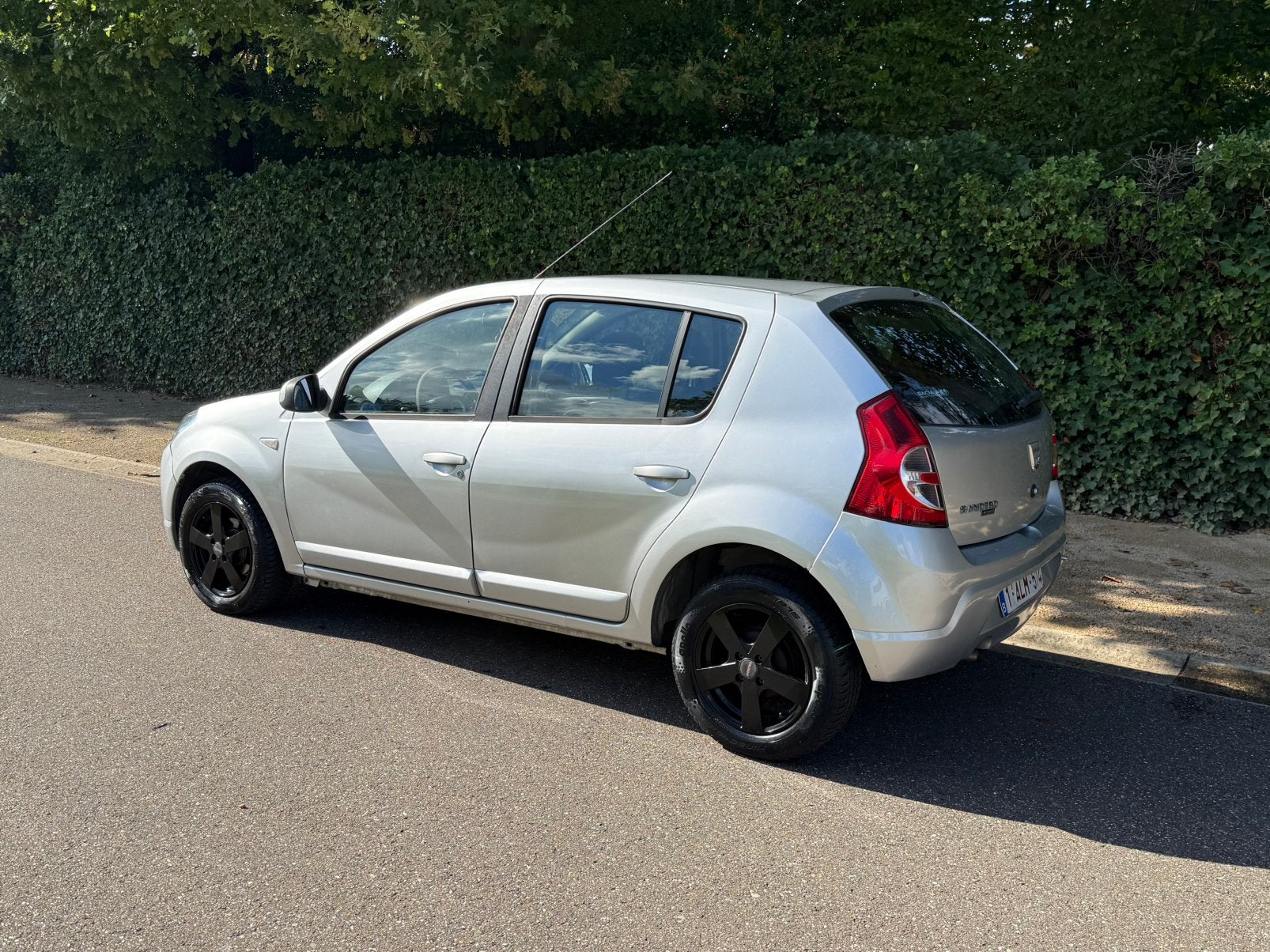 Dacia sandero 1.4 103000km met airco, Auto's, Voorwielaandrijving, Stof, Bluetooth, Zwart