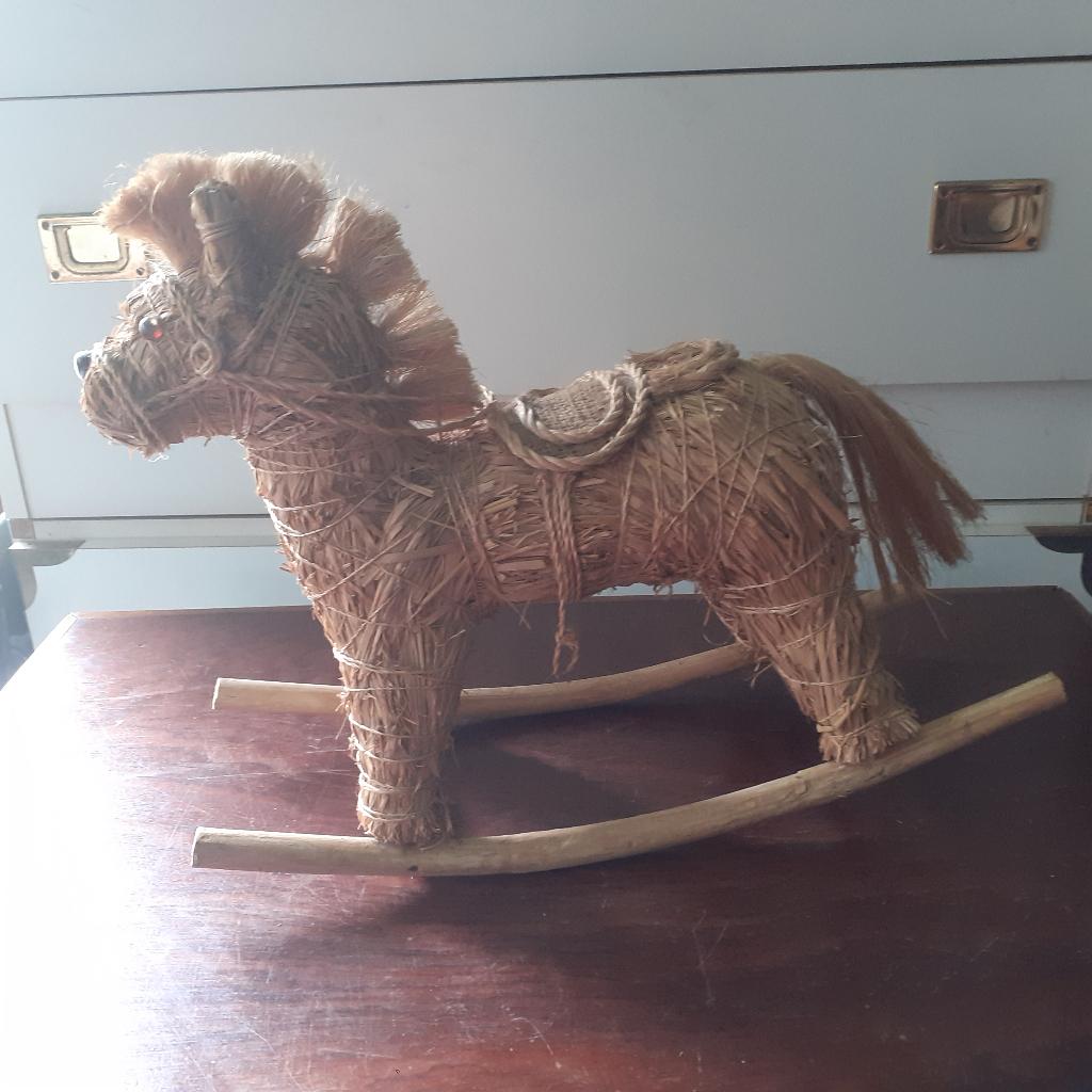 schommel paardje en fietsje in riet en rotan, Ophalen