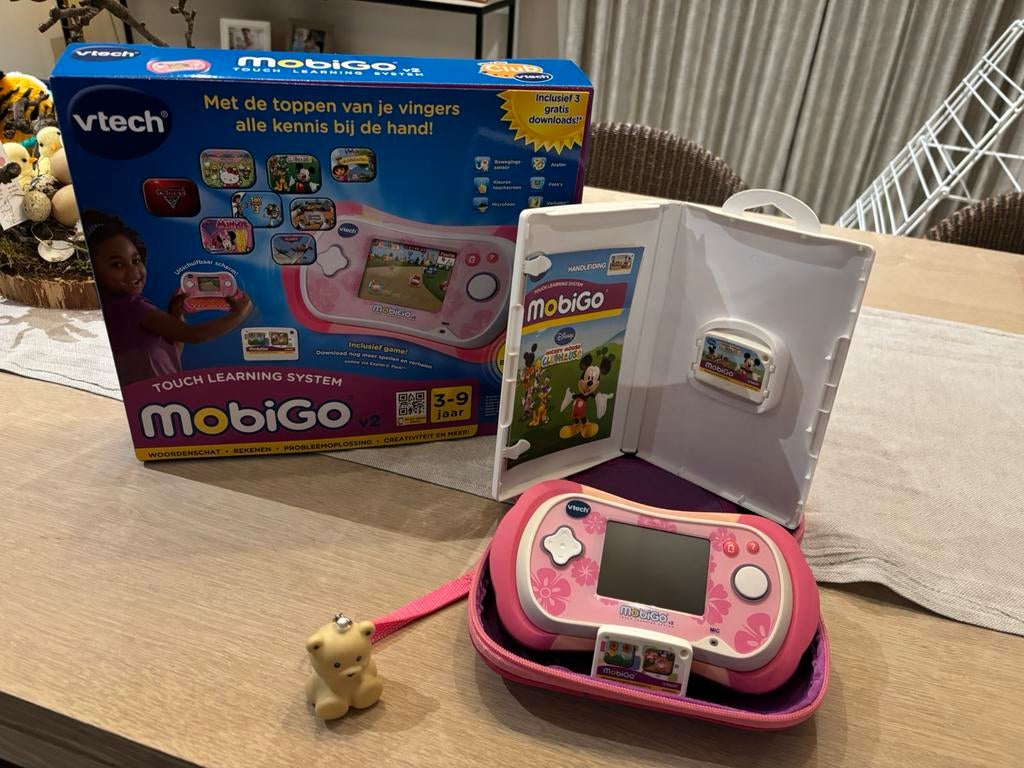 VTech MobiGo 2 met draagtas en 2 spelletjes, Enfants & Bébés, Jouets | Vtech, Enlèvement, Comme neuf