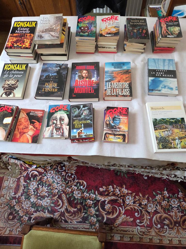 Collection de 52 livres en parfait état, Ophalen