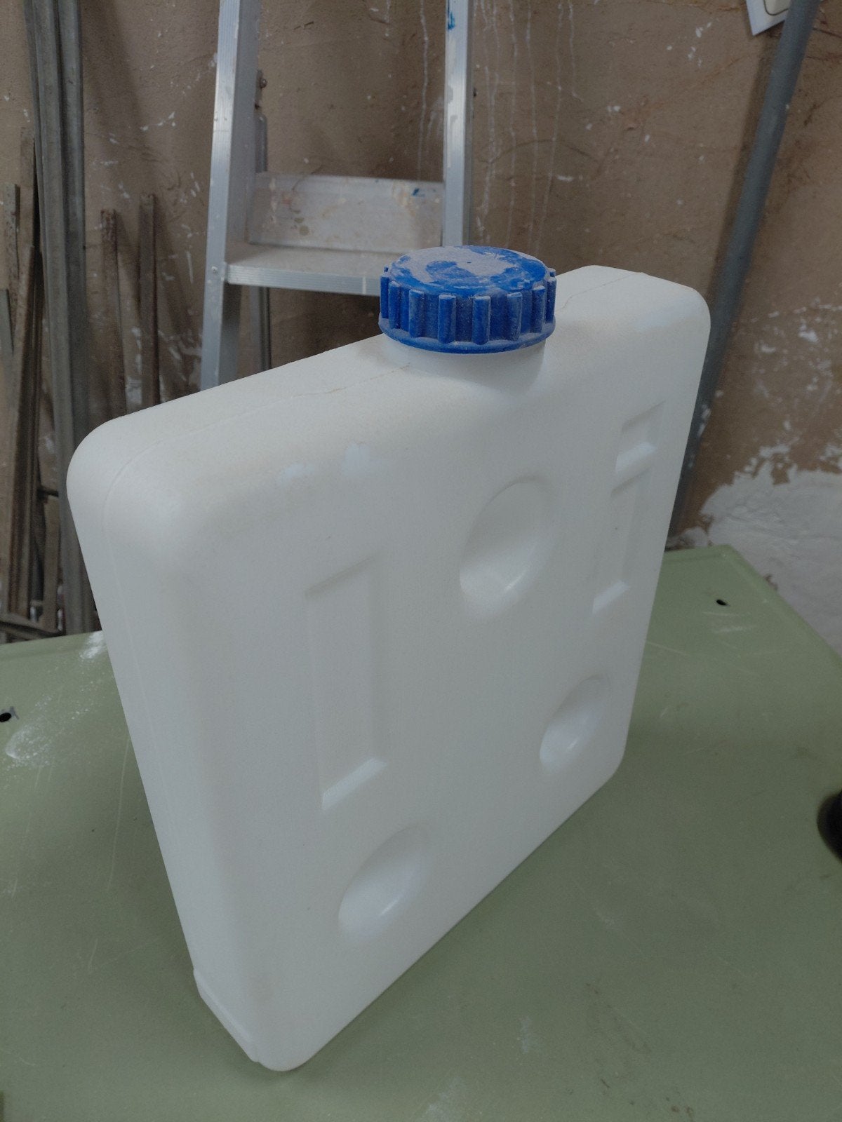 Mazout tankje, Ophalen