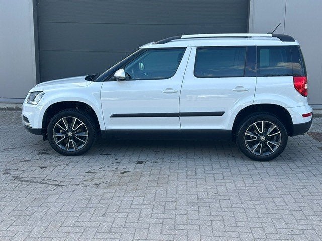Skoda Yeti benzine automaat 50.000km pano dak, Auto's, Stof, 4 cilinders, Wit, Bedrijf