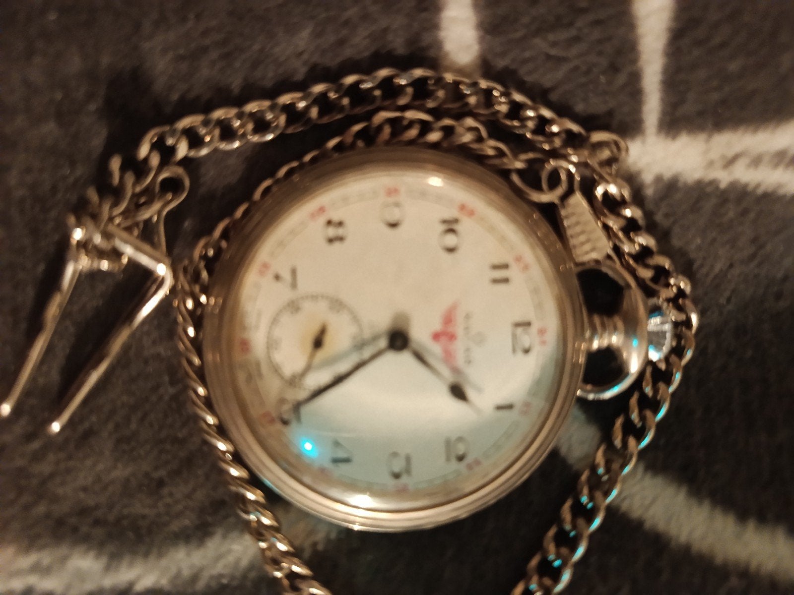 zakhorloge Nacar, Enlèvement, Montre de poche
