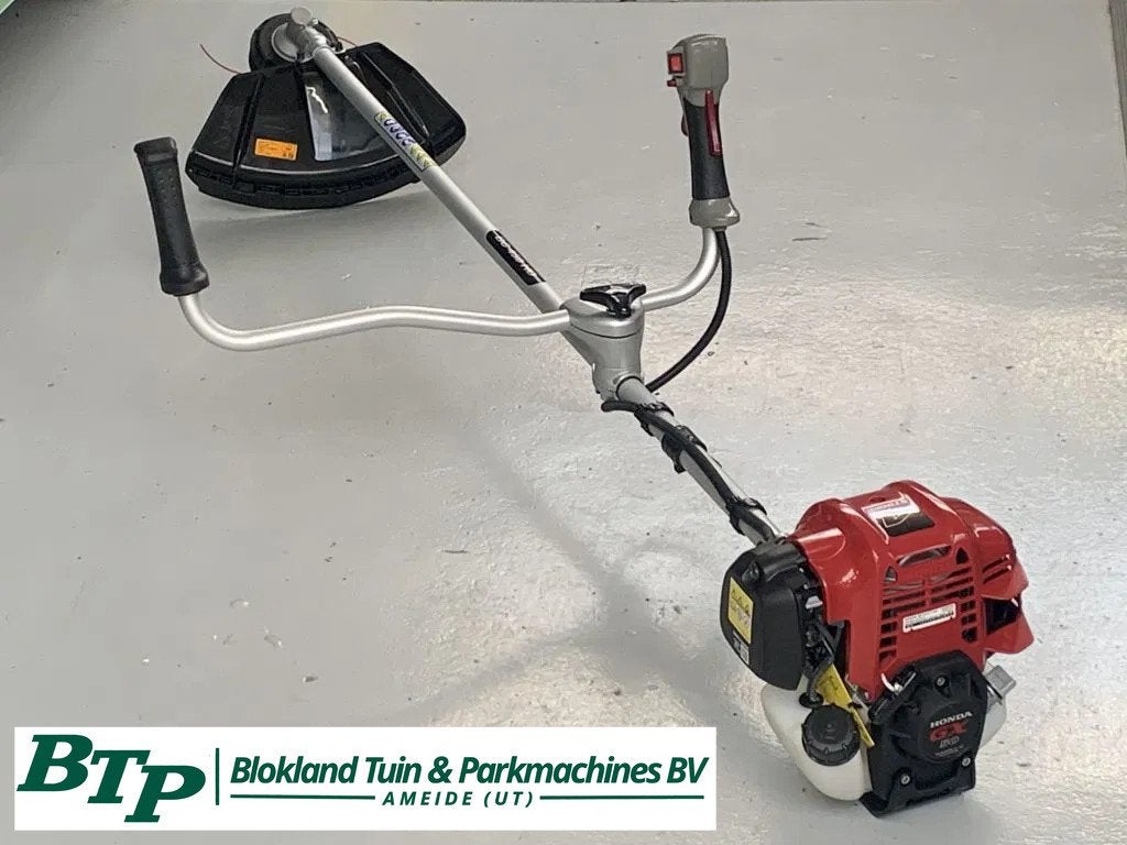 Honda bosmaaier actie Nieuw! 4 takt incl. harnas en mes, Articles professionnels, Faucheuse