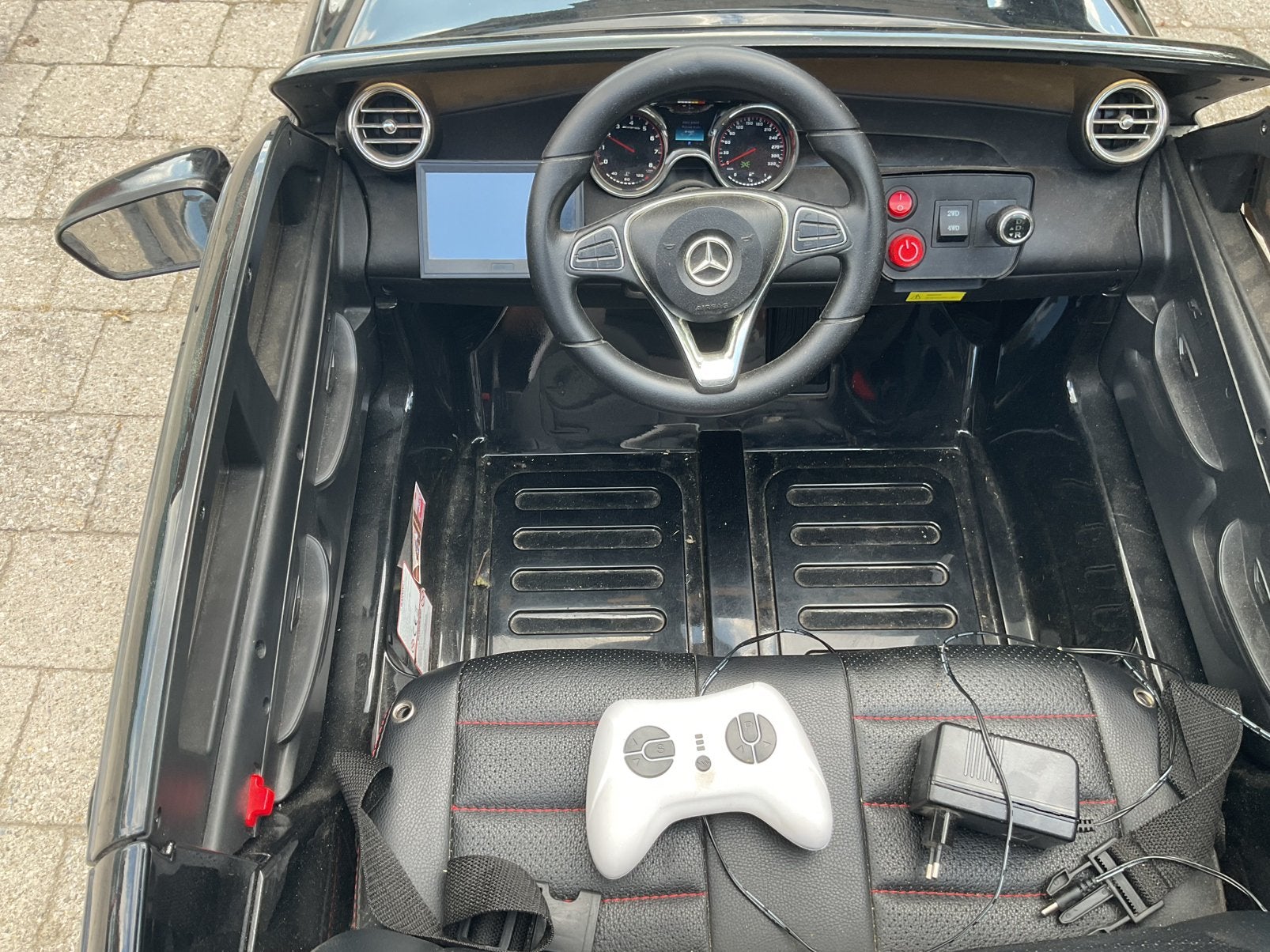 Kinderauto op batterij, Ophalen, Gebruikt