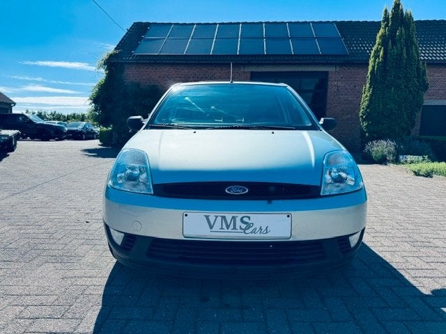 Ford Fiesta 1.25 Benzine * Garantie * Euro4 *, Auto's, Stof, 1242 cc, 4 cilinders, Grijs