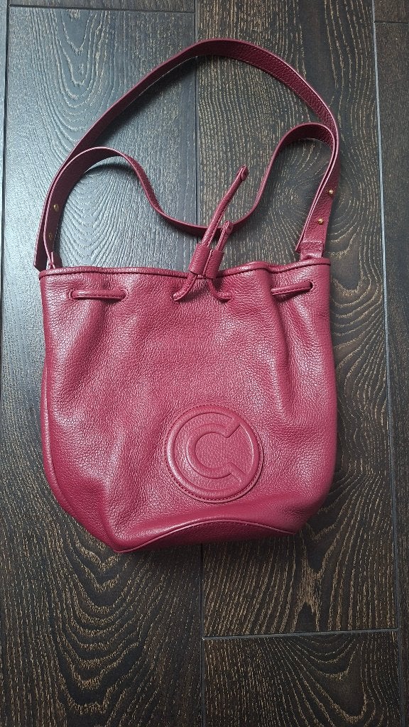 Sac seau et sac à bandoulière en cuir Coccinelle bordeaux, Enlèvement ou Envoi, Comme neuf, Autres marques, Cuir